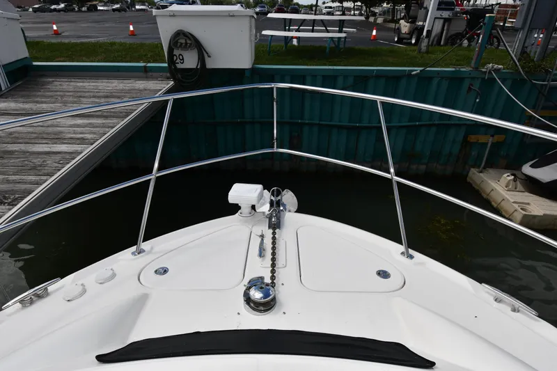 Slide: The Image of Bow view of 2005 Sea Ray 390 Motor Yacht docked at marina. - 4