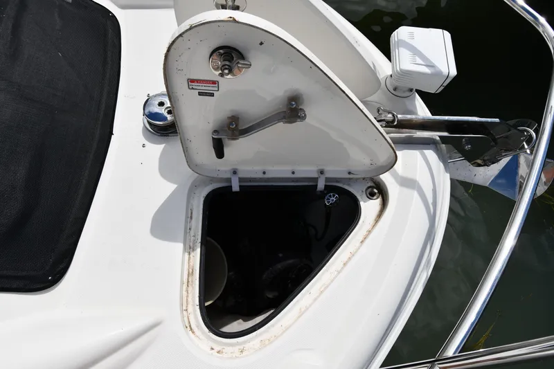 Slide: The Image of Open hatch on 2005 Sea Ray 390 Motor Yacht, showing anchor storage compartment. - 5