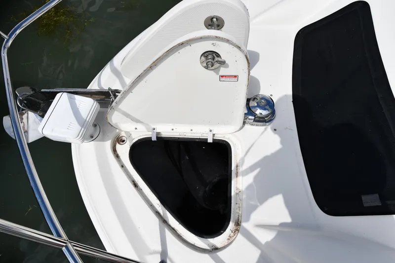 Slide: The Image of Open hatch on 2005 Sea Ray 390 Motor Yacht deck, showing storage compartment. - 6