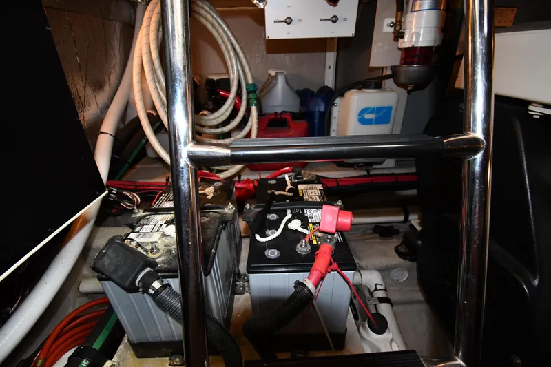 Slide: The Image of Engine room of 2005 Sea Ray 390 Motor Yacht with batteries and wiring. - 63