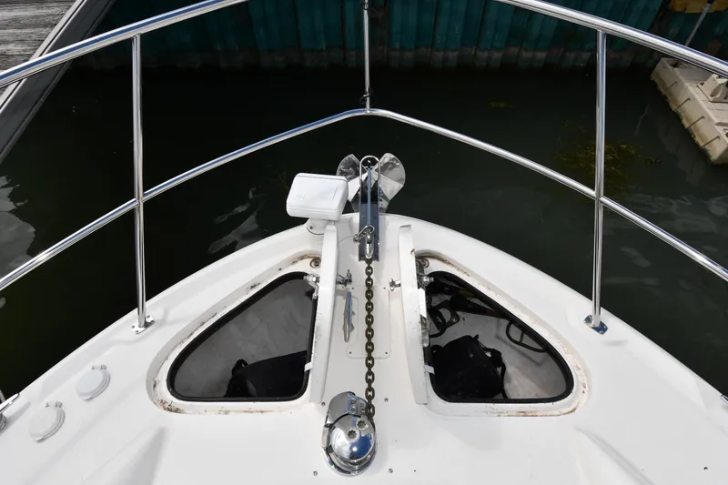 Slide: The Image of Bow view of 2005 Sea Ray 390 Motor Yacht with anchor chain and railing. - 7