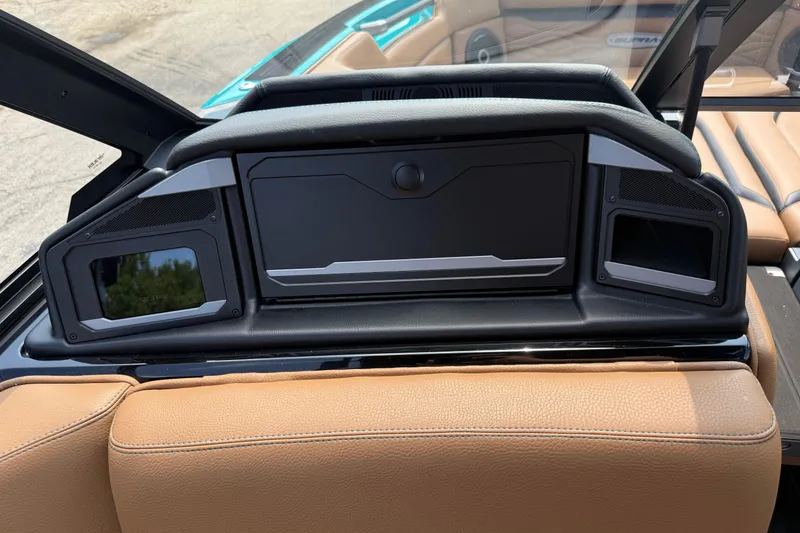 Slide: The Image of 2026 Supra SE 550 interior dashboard with modern design and tan leather seats. - 21