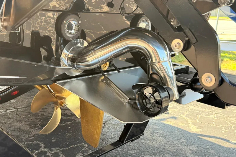 Slide: The Image of Close-up of 2026 Supra SE 550 boat propeller and exhaust system. - 24