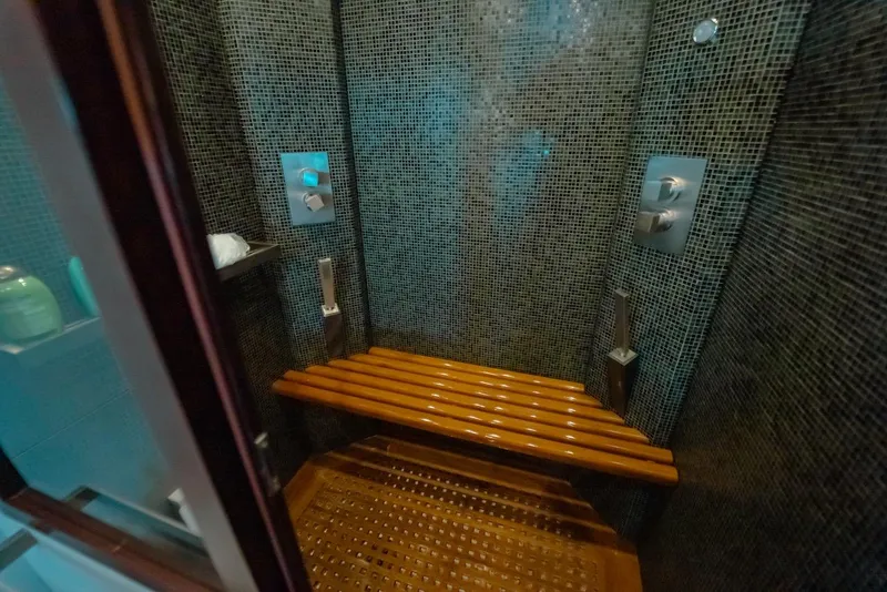 Slide: The Image of Luxurious shower with wooden bench in 2007 Mangusta 92 yacht. - 40