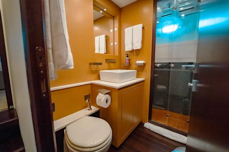 Slide: The Image of Luxurious bathroom in 2007 Mangusta 92 yacht with modern fixtures and elegant design. - 48