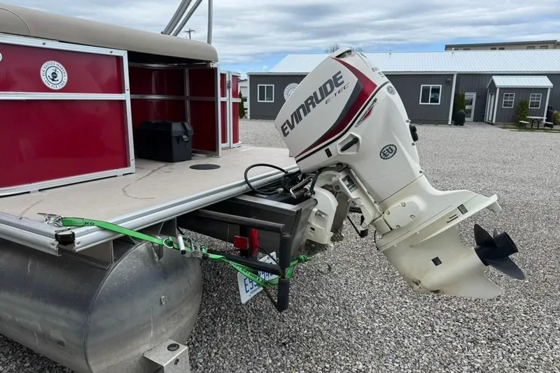 Slide: The Image of 2017 Starcraft EX 20 RDP pontoon boat with Evinrude outboard motor. - 6