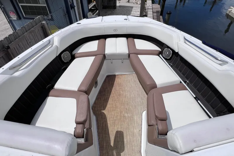 Slide: The Image of 2015 Cobalt 26SD boat interior with spacious seating and elegant design. - 32