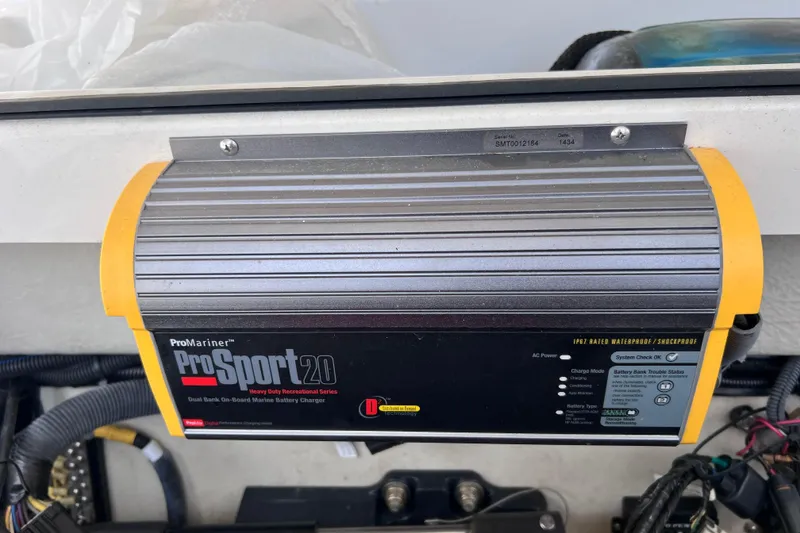 Slide: The Image of ProMariner ProSport 20 marine battery charger in a 2015 Cobalt 26SD boat. - 56