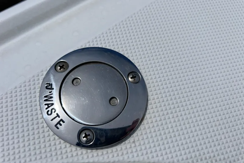 Slide: The Image of Chrome waste cap on 2015 Cobalt 26SD boat deck. - 59