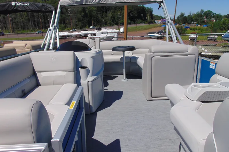 Slide: The Image of 2026 Godfrey eX1680 CX pontoon boat interior with spacious seating and modern design. - 4