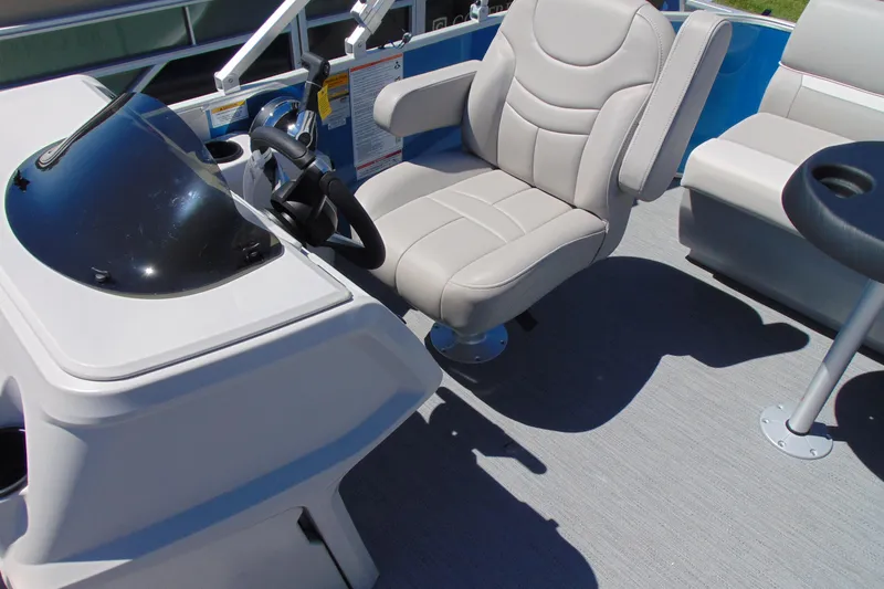 Slide: The Image of Captain's seat and helm of 2026 Godfrey eX1680 CX pontoon boat. - 7