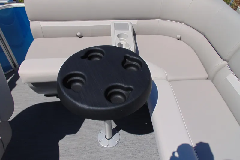 Slide: The Image of Luxury seating and cup holder on 2026 Godfrey eX1680 CX pontoon boat. - 9