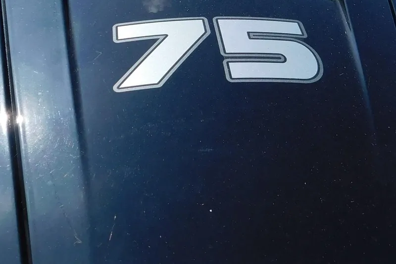 Slide: The Image of Close-up of '75' decal on 2025 Tracker Pro Team 175 boat. - 9