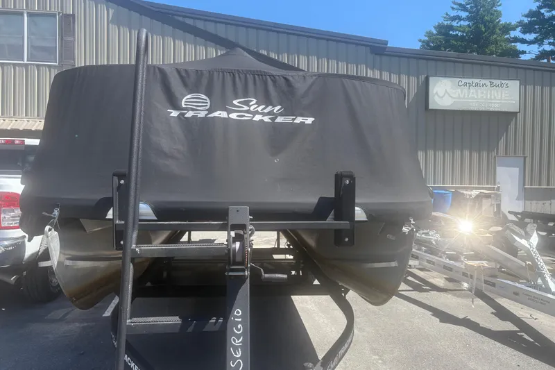 Slide: The Image of 2021 Sun Tracker Party Barge 20 DLX covered, parked at Captain Bub's Marine. - 4