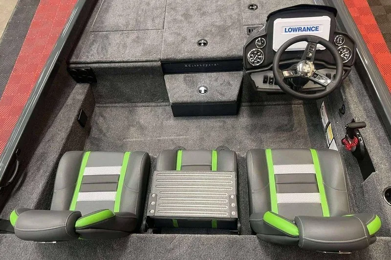 Slide: The Image of 2026 Ranger RT188P boat interior with steering wheel, seats, and Lowrance electronics. - 4