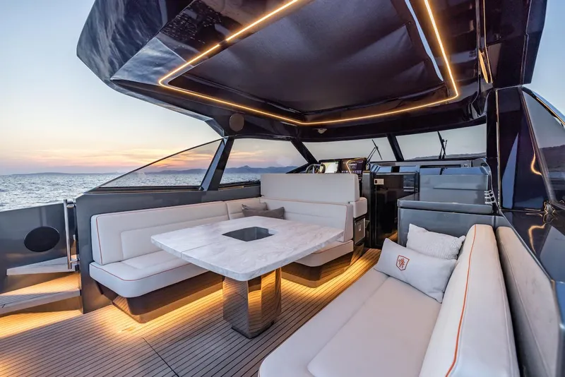 Slide: The Image of Luxurious 2023 Bekkers Yachts Azur 45HT interior with elegant seating and sunset view. - 43