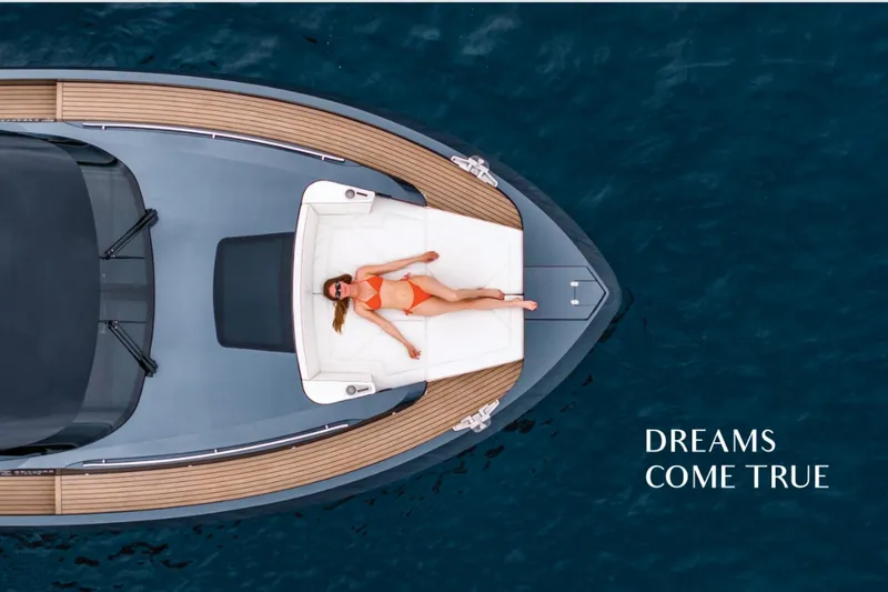 Slide: The Image of 2023 Bekkers Yachts Azur 45HT with sunbather, captioned "Dreams Come True." - 5