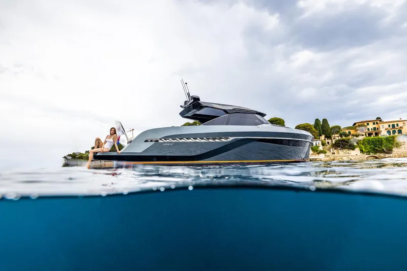 Slide: The Image of 2023 Bekkers Yachts Azur 45HT cruising near a scenic coastline. - 26