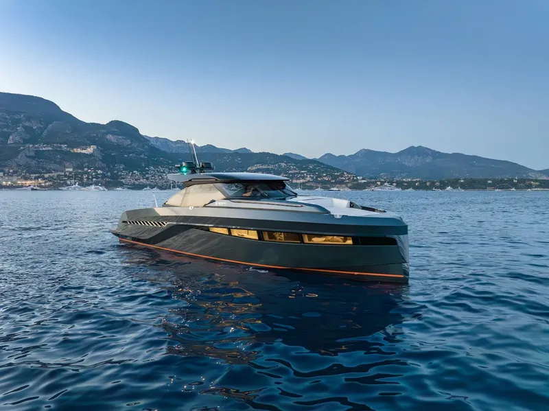 Slide: The Image of Luxurious 2023 Bekkers Yachts Azur 45HT cruising on serene waters with mountainous backdrop. - 29