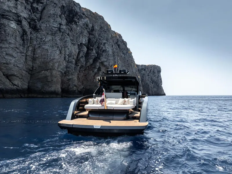 Slide: The Image of 2023 Bekkers Yachts Azur 45HT cruising near rocky cliffs in clear blue waters. - 47