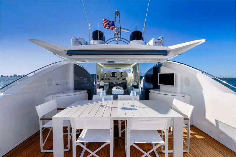 Slide: The Image of 2008 Sunseeker Predator 108 yacht with elegant outdoor dining area and ocean view. - 17