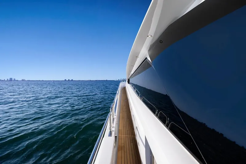 Slide: The Image of Side view of 2008 Sunseeker Predator 108 yacht cruising on open water. - 19