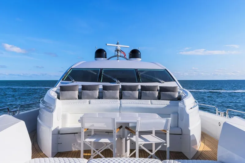 Slide: The Image of Sunseeker Predator 108 yacht, 2008 model, cruising on open sea under clear blue sky. - 2