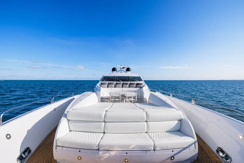 Slide: The Image of Sunseeker Predator 108 yacht, 2008 model, cruising on open sea under clear blue sky. - 21