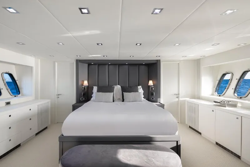 Slide: The Image of Luxurious bedroom interior on 2008 Sunseeker Predator 108 yacht, featuring modern design and ocean views. - 24