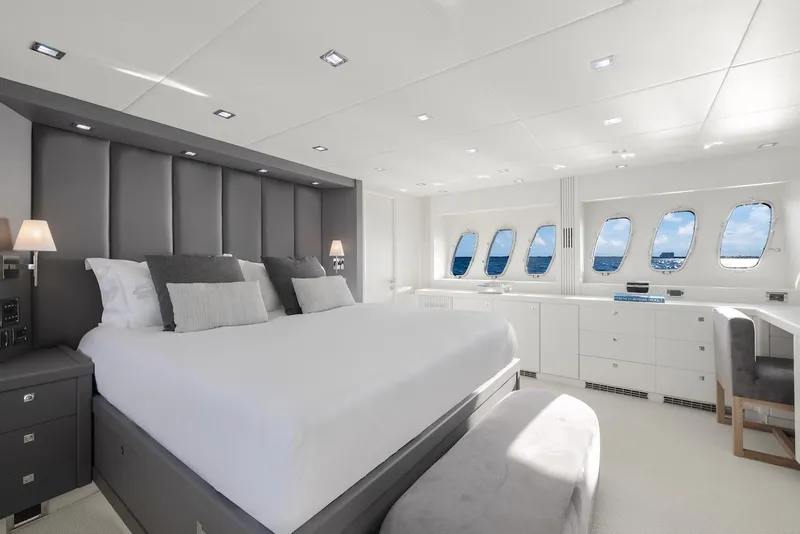 Slide: The Image of Luxurious bedroom interior of 2008 Sunseeker Predator 108 yacht with ocean view windows. - 25