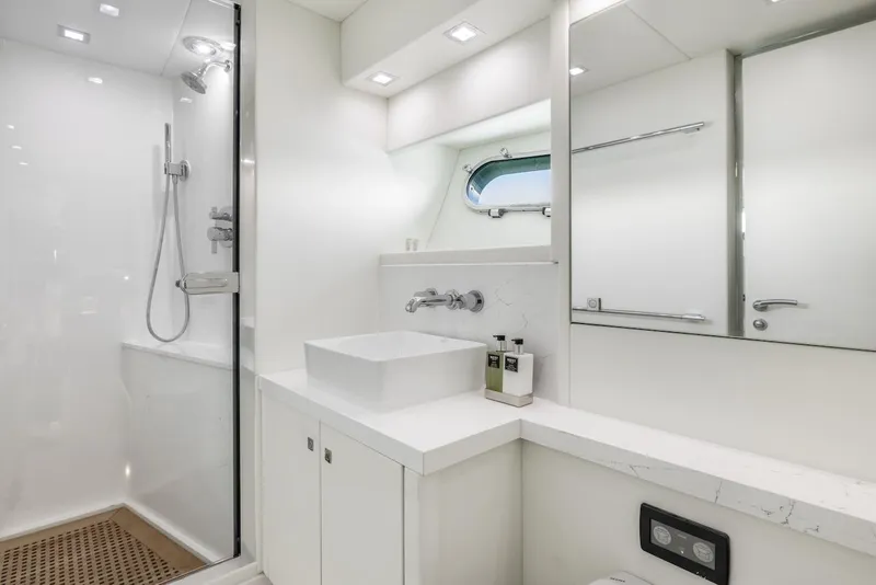 Slide: The Image of Luxurious bathroom on 2008 Sunseeker Predator 108 yacht, featuring modern fixtures and sleek design. - 34