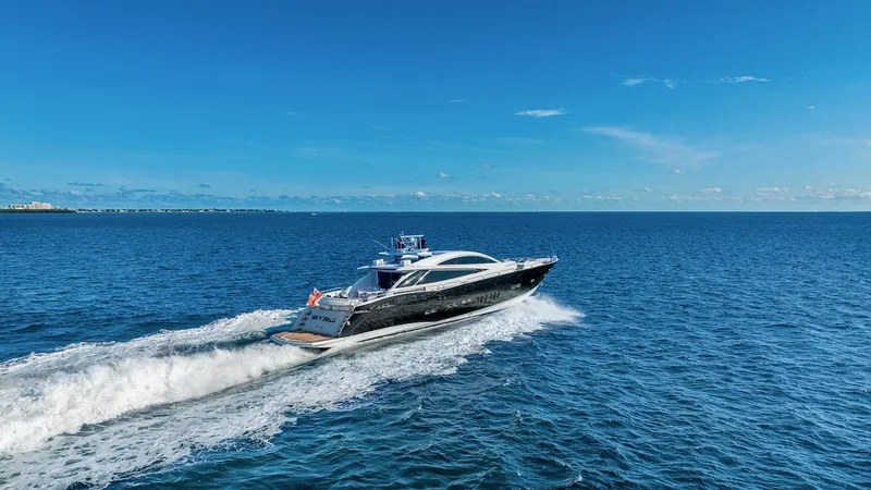 Slide: The Image of 2008 Sunseeker Predator 108 yacht cruising on open blue sea under clear sky. - 45