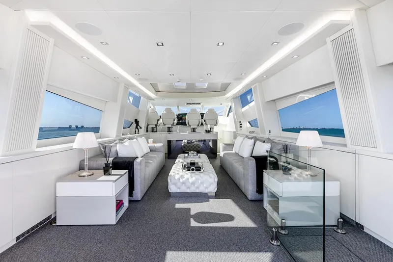 Slide: The Image of Luxurious interior of a 2008 Sunseeker Predator 108 yacht, featuring elegant white furnishings. - 8