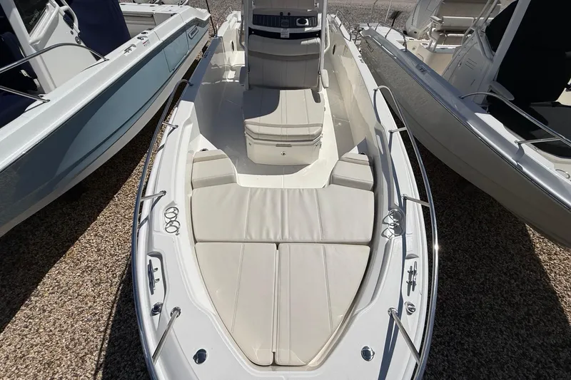 Slide: The Image of 2026 Boston Whaler 250 Dauntless boat with spacious seating and sleek design. - 20