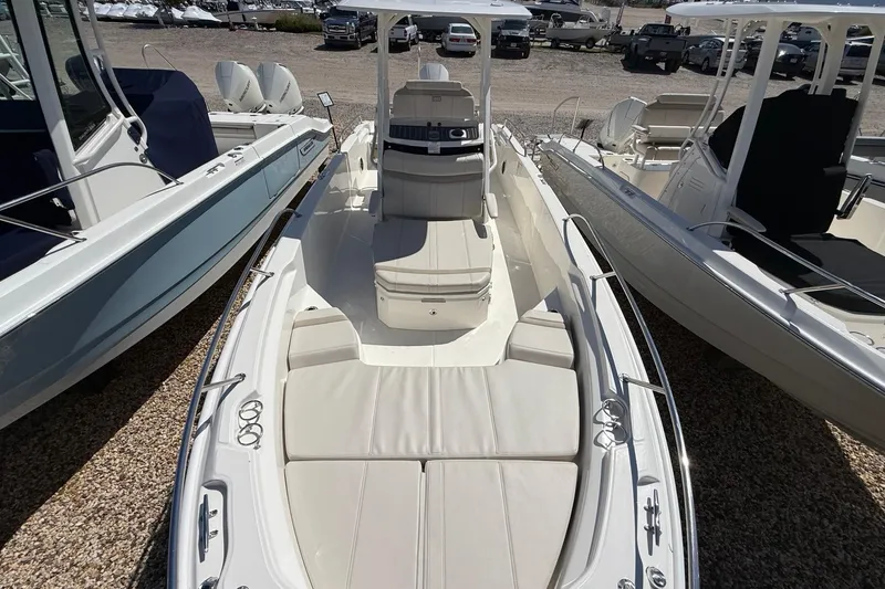 Slide: The Image of 2026 Boston Whaler 250 Dauntless boat with spacious seating and sleek design. - 21