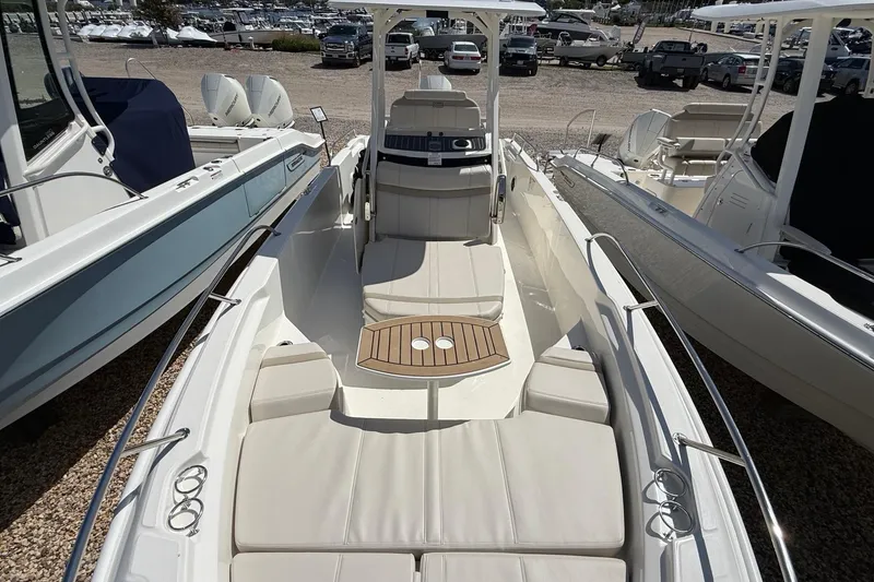 Slide: The Image of 2026 Boston Whaler 250 Dauntless boat with spacious seating and sleek design. - 22