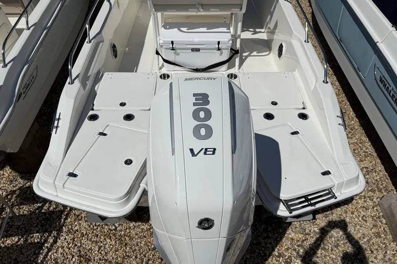 Slide: The Image of 2026 Boston Whaler 250 Dauntless with Mercury 300 V8 engine, top view. - 5