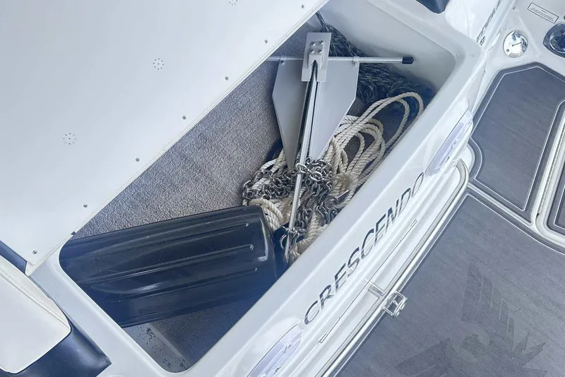 Slide: The Image of Storage compartment of 2007 Formula 310 Sun Sport boat with anchor and ropes. - 12