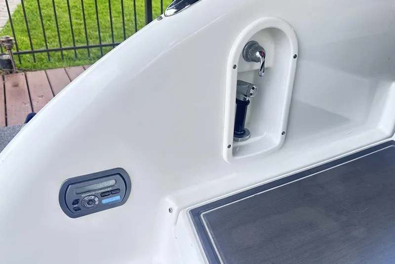 Slide: The Image of 2007 Formula 310 Sun Sport boat interior with control panel and faucet detail. - 14