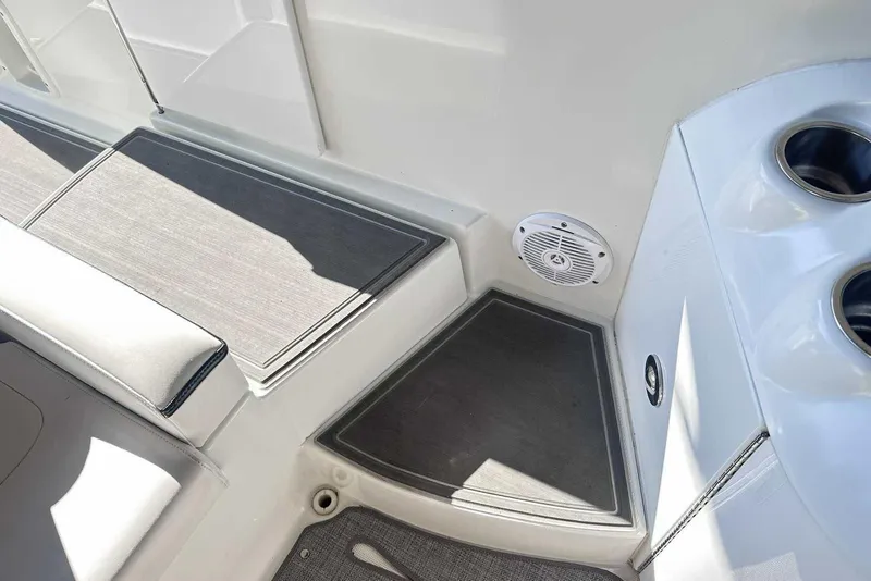 Slide: The Image of 2007 Formula 310 Sun Sport boat interior with speaker and cup holders. - 15