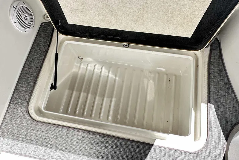 Slide: The Image of Storage compartment in 2007 Formula 310 Sun Sport boat, featuring a spacious interior and durable design. - 20