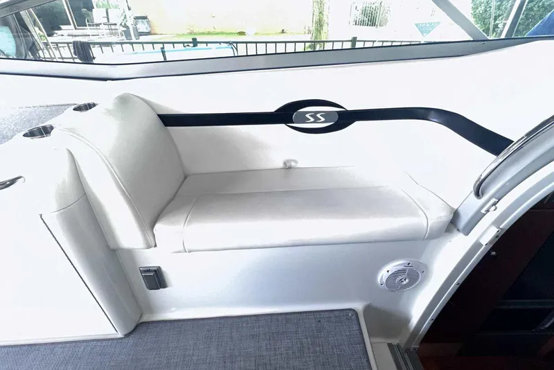 Slide: The Image of 2007 Formula 310 Sun Sport interior with white seating and sleek design elements. - 23