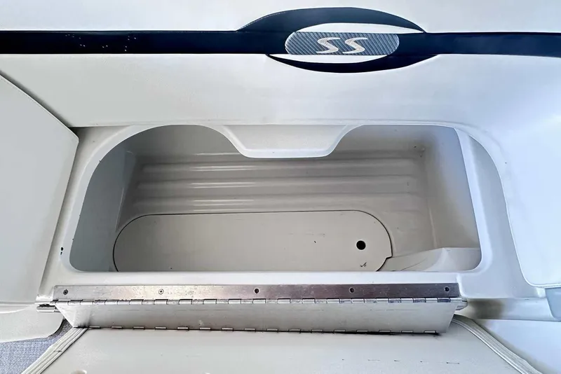 Slide: The Image of Storage compartment of a 2007 Formula 310 Sun Sport boat, open and empty. - 24