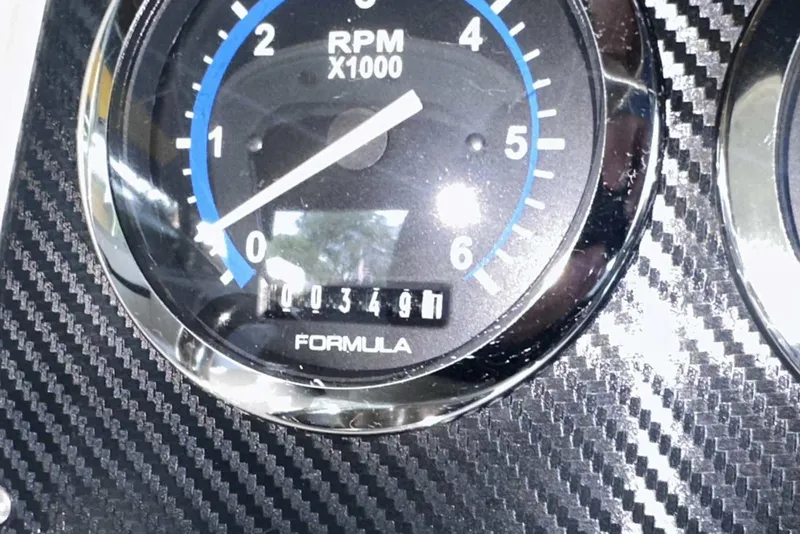 Slide: The Image of Close-up of 2007 Formula 310 Sun Sport RPM gauge on carbon fiber dashboard. - 33