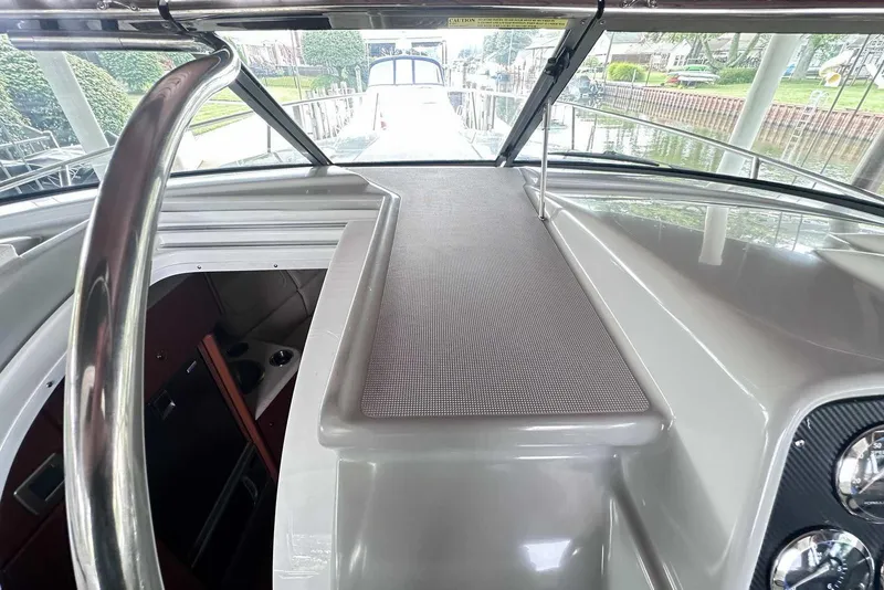 Slide: The Image of 2007 Formula 310 Sun Sport boat interior with dashboard and cabin entrance. - 36