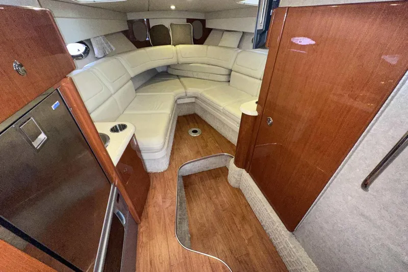 Slide: The Image of 2007 Formula 310 Sun Sport cabin with wood finish and cream seating. - 37