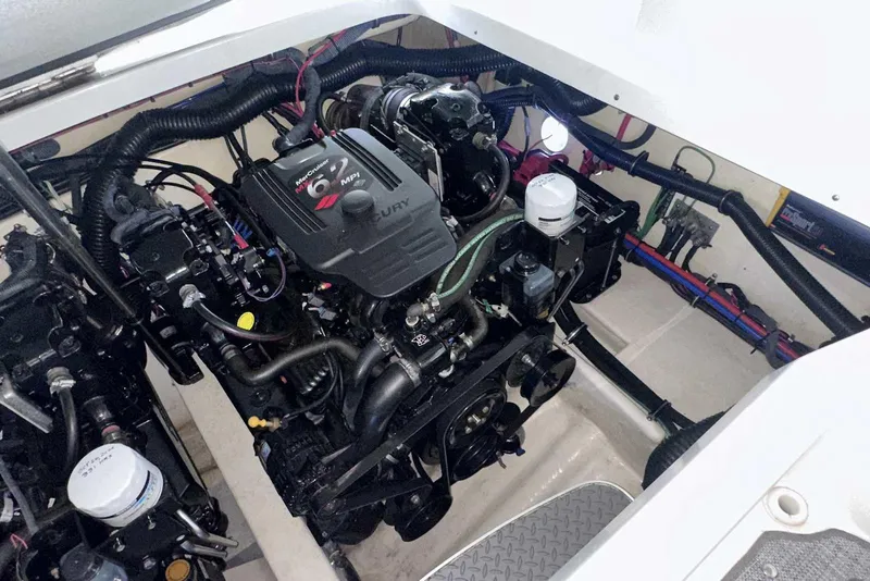 Slide: The Image of Engine compartment of a 2007 Formula 310 Sun Sport boat, featuring a Mercury 6.2 MPI engine. - 51