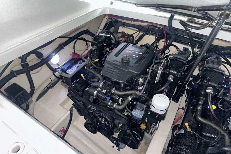 Slide: The Image of Engine compartment of a 2007 Formula 310 Sun Sport boat, showcasing detailed mechanical components. - 52