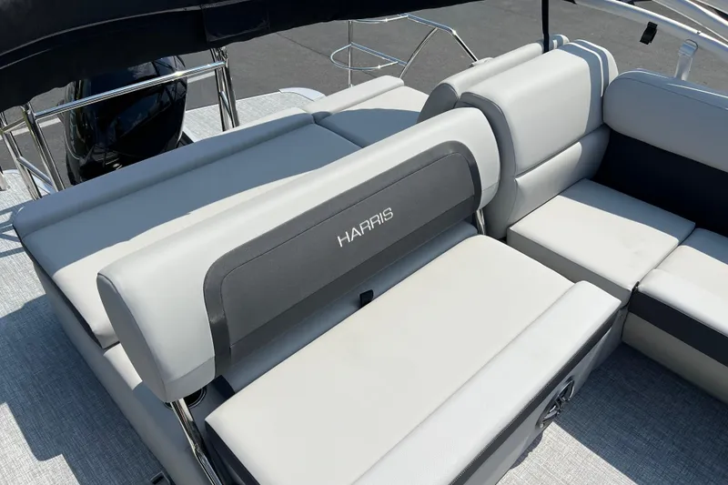 Slide: The Image of 2025 Harris Cruiser 230 boat interior with luxurious seating and modern design. - 19