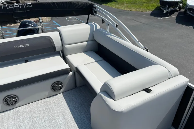 Slide: The Image of 2025 Harris Cruiser 230 boat interior with sleek gray seating and modern design. - 20